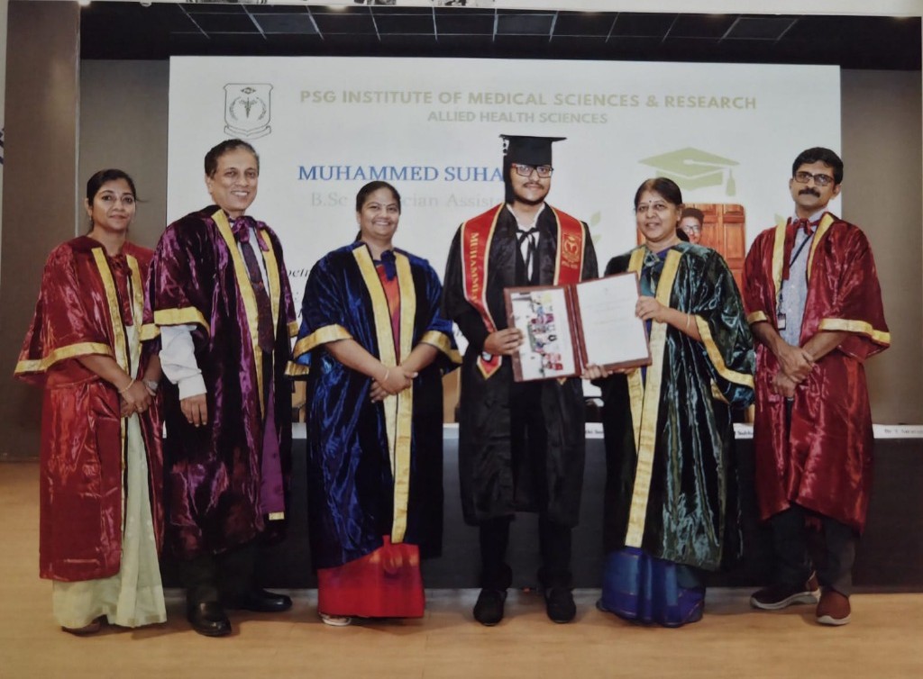 Muhammed Suhail receiving the Course Topper award with faculty at PSG Institute of Medical Sciences & Research graduation ceremony